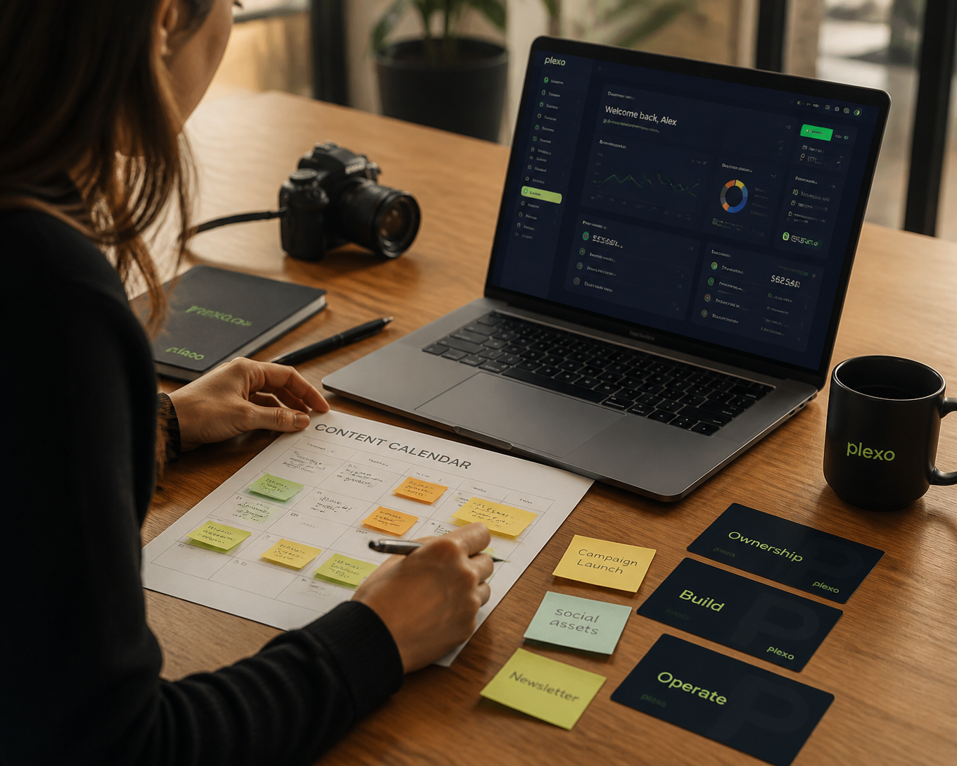Operator at a desk with a Plexo content calendar, laptop dashboard and branded system cards